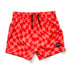 A pair of orange swim trunk shorts with a wavy checkered pattern and a drawstring waist.