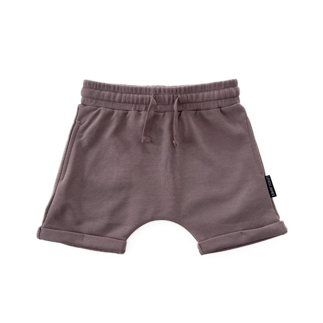 Brown shorts with a drawstring on a white background