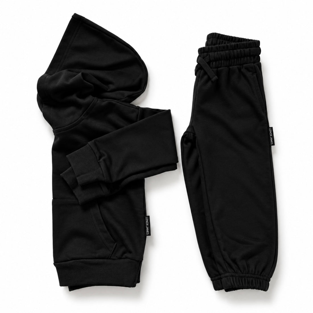 LENOX JAMES kids hoodie in black styled alongside matching joggers as a coordinated two-piece outfit.
