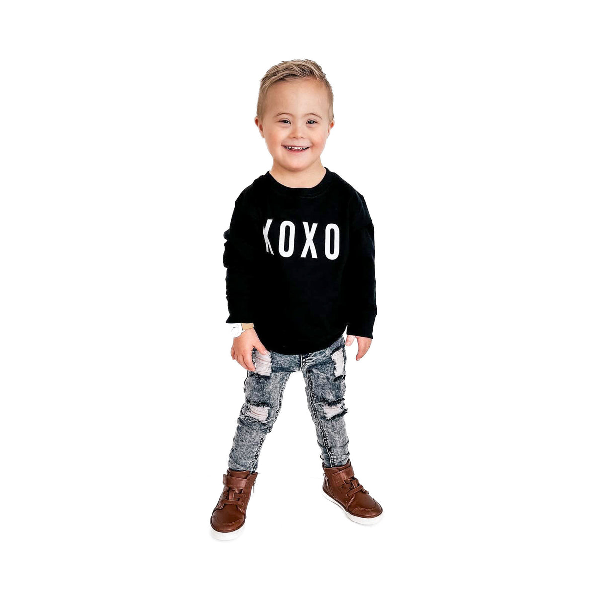 Child wearing LENOX JAMES grey wash distressed stretch jeans with a black graphic sweatshirt
