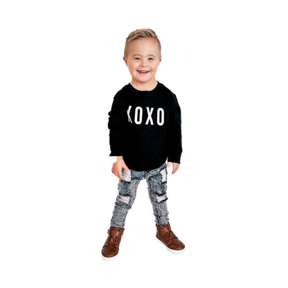 Child wearing LENOX JAMES grey wash distressed stretch jeans with a black graphic sweatshirt