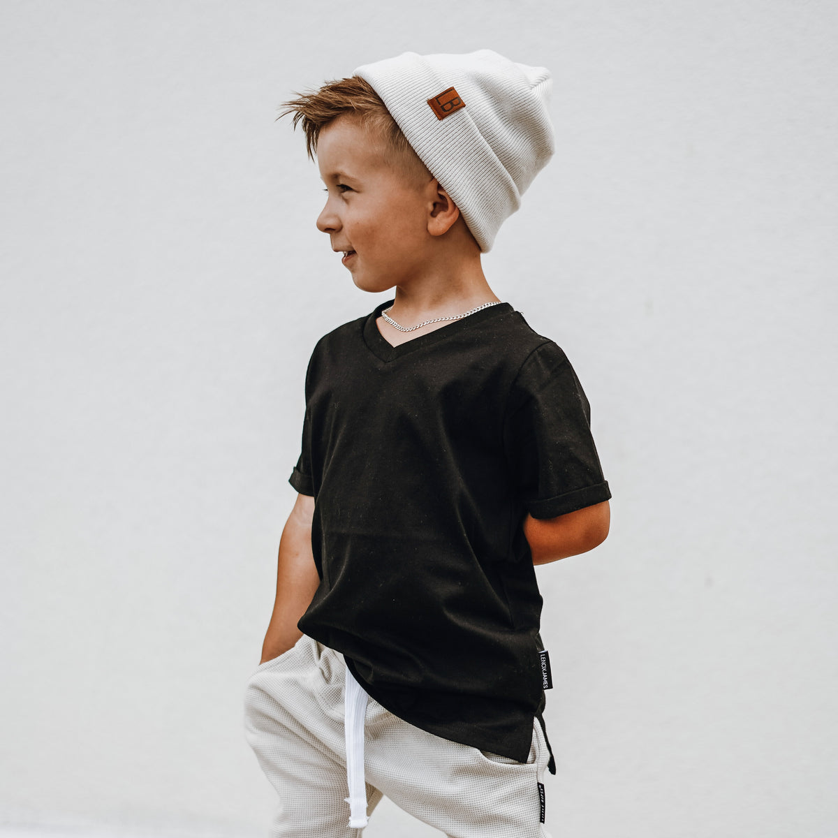Toddler wearing LENOX JAMES black cotton v-neck basic tee