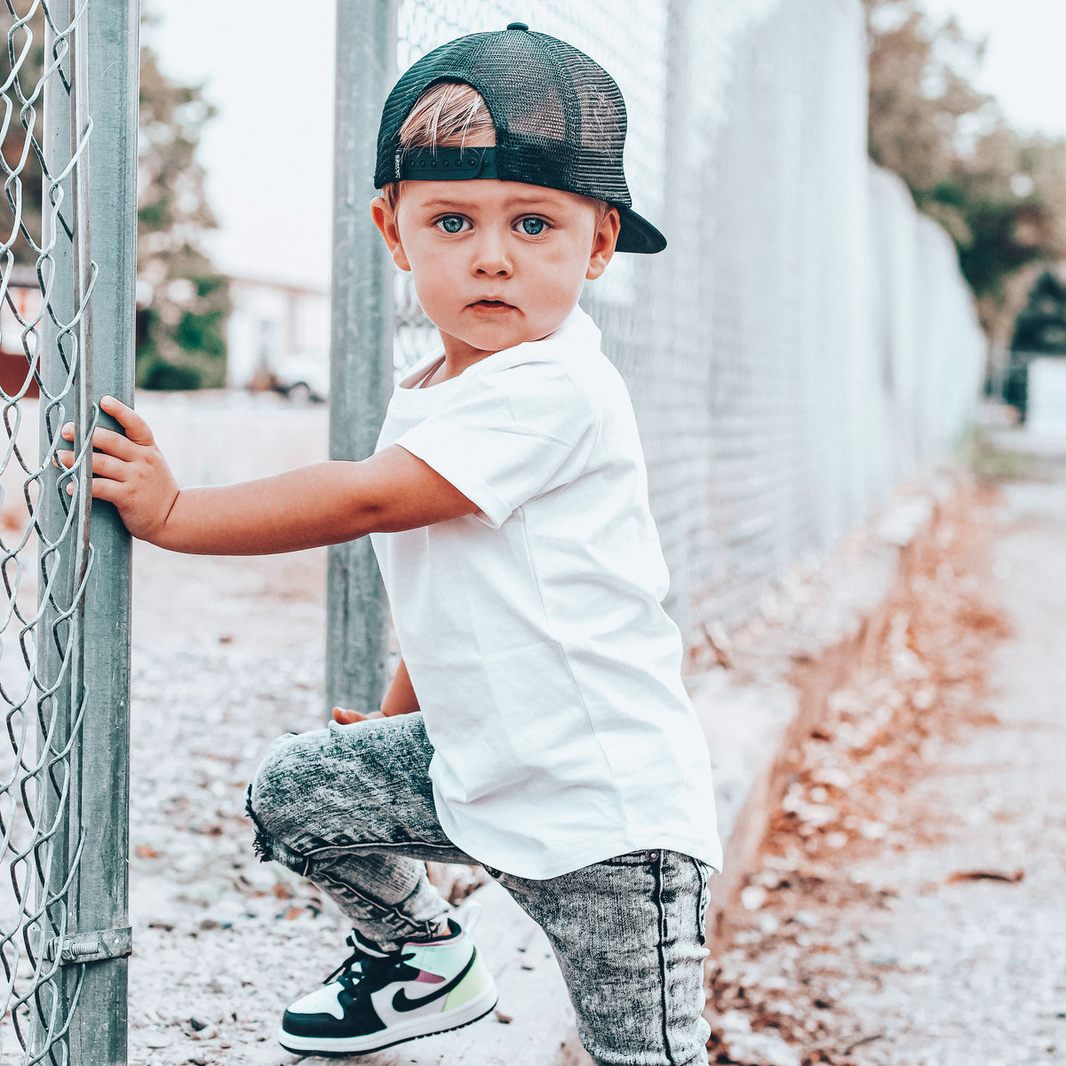 Child wearing a LENOX JAMES white cotton basic tee styled for everyday wear